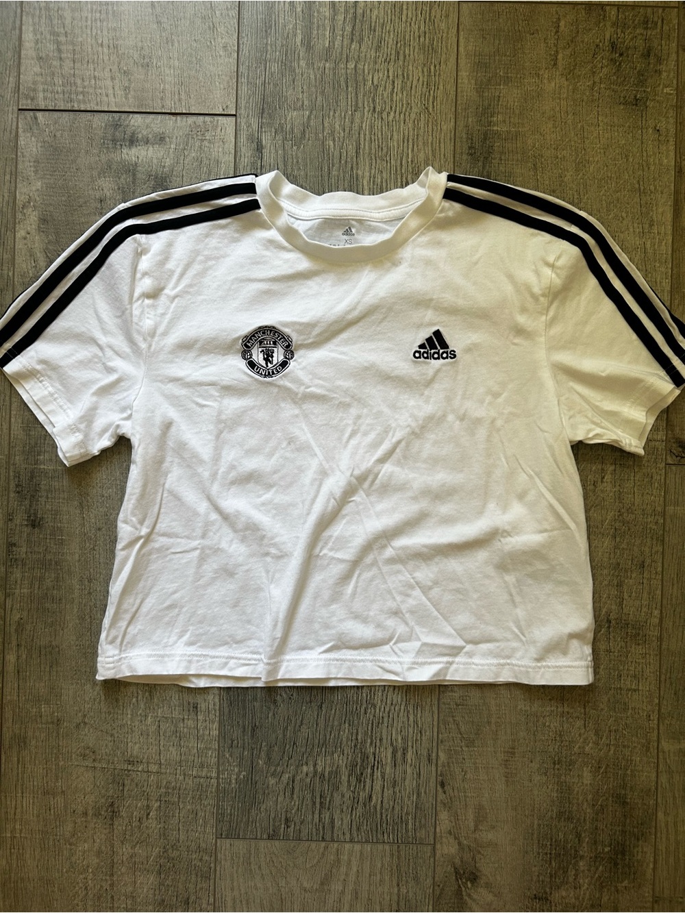 adidas Manchester united White shirt  with Black Shoulder Stripes and badge